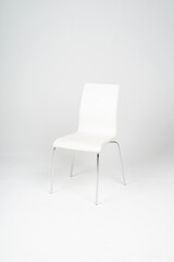white comfortable chair on white background. minimal concept idea