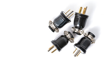 Black electric connect plugs isolated on white background with copy space for text.