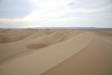Fototapeta na wymiar Sand dunes near Huacachina oasis, Peru
