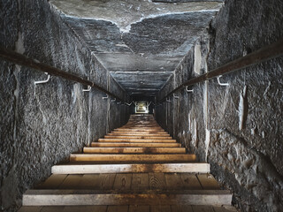 Descent into ancient Egyptian pyramid. Ancient catacombs. - obrazy, fototapety, plakaty