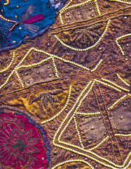 Indian sari pieces recycled and sewn together to make wall hangings or cushions