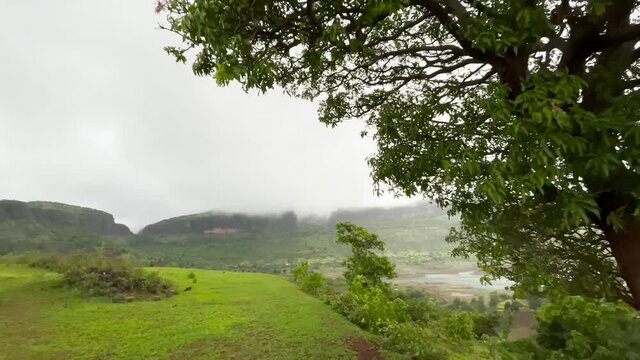 Meadow Hills Overlooking Brahmagiri Ridges Against Overcast Sky At Trimbakeshwar In Western Ghats, Maharashtra, India. - Aerial Shot