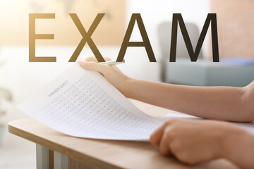 Student passing exam at university