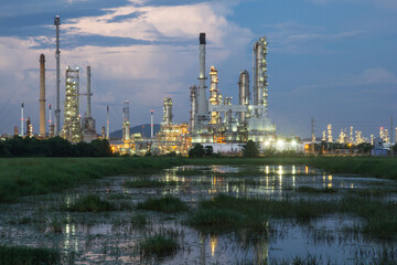 Oil refinery at twilight with sky