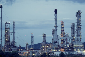 Oil refinery at twilight with sky
