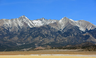 the spectacular sangre de cristo mountains across the san luis valley near great sand dunes...
