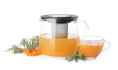 Teapot of healthy sea buckthorn tea on white background