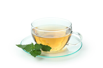 Cup of nettle tea isolated on white background