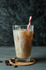 Concept of cold drink with ice coffee on wooden table