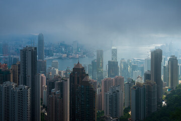 Fototapeta na wymiar Victoria Harbor view from the Peak in Fog, Hong Kong