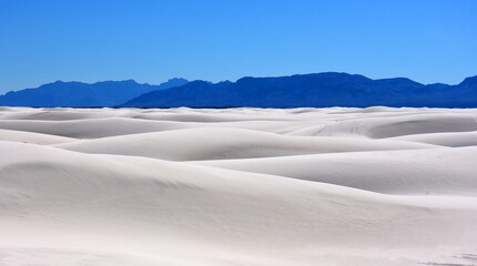 the san andres mountain range  and the vast expanses  of  white sands national monument on a sunny day, near alamogordo, new mexico