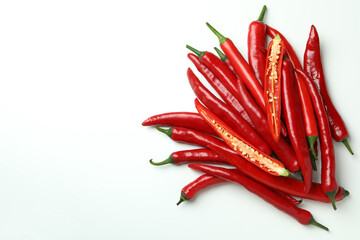 Red hot chili peppers on white background