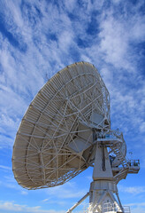 a radio telescope in a giant dish antenna at the karl g. Jansky very large array radio astronomy observatory  near socorro, new mexico 