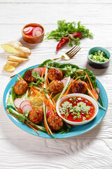 Vietnamese banh mi salad with meatballs, top view
