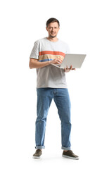 Handsome man using laptop on white background