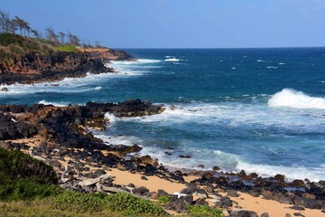 Fototapeta na wymiar the pineapple dump pier, coastline, and surf along the kauai path, north of kapa'a, kauai, hawaii