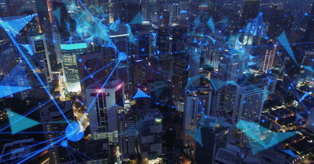 AERIAL. Network and Connection technology concept with Kuala Lumpur city at night time