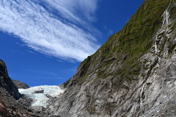 the spectacular terminus of the franz joseph glacier and waterfalls as seen from the franz joseph glacier walk on the west coast of the south island of new zealand