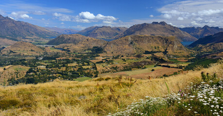 spectacular view  across speargrass flat lower shotover, and dalefield to lake hayes,  from coronet  peak. near queenstown on the south island of new zealand