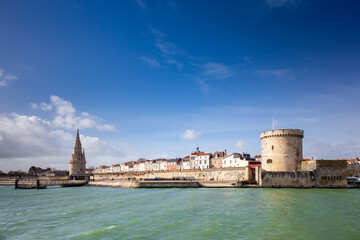 Entrance of the old harbor of La Rochelle in France, with the Tour de la Chaine on the right side and Tour de la Lantern on the left side, Nouvelle Aquitaine region, Charente-Maritime, France