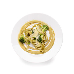 Plate with tasty pasta and vegetables on white background