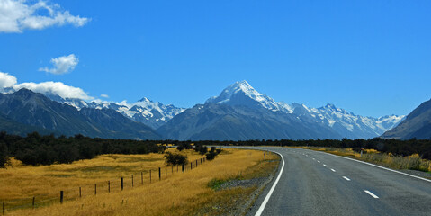 mount cook and spectacular glaciated mountain  scenery on a sunny day in summer  on the  road to  mount cook village on the south island of new zealand