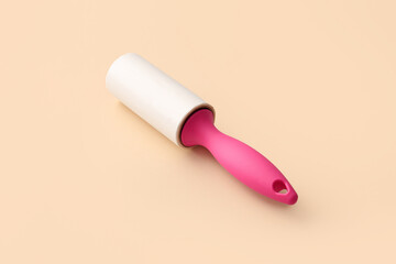 Lint roller on color background