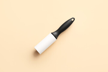 Lint roller on color background