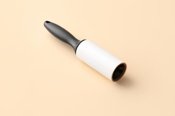 Lint roller on color background