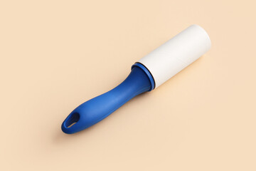 Lint roller on color background