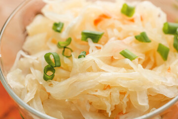 Tasty sauerkraut in bowl, closeup