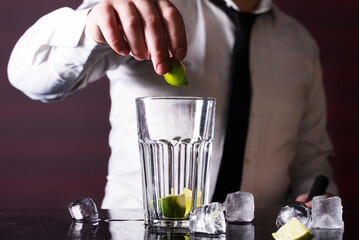 Cocktail on background. Cocktail at the bar. Alcoholic drink at the night club.