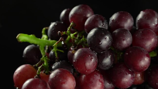 Fresh grapes in black background
