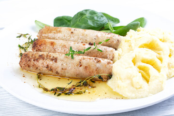 Grilled chicken sausages with mashed potatoes