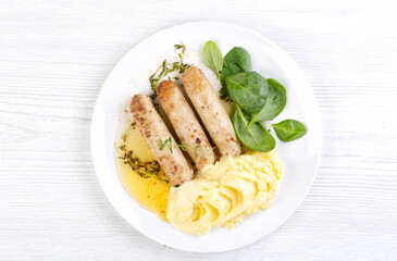 Grilled chicken sausages with mashed potatoes
