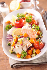 salmon cooked with vegetables and spices