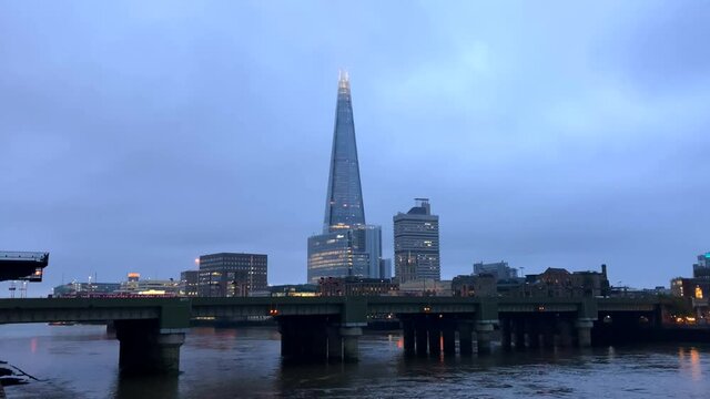 The Shard skyscraper and River Thames in city of London on a gloomy stormy day