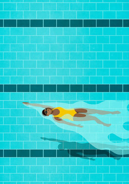 Woman swimming backstroke in blue swimming pool
