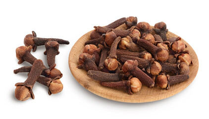 Fototapeta premium Dry spice cloves in wooden bowl isolated on white background with clipping path and full depth of field.