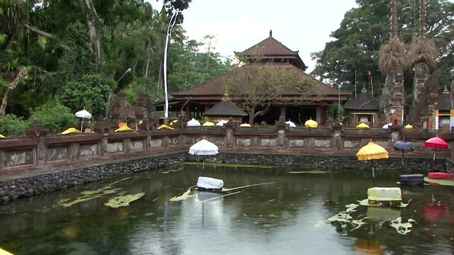 The Tirta Empul Temple, Bali, Indonesia, in a rainy day.