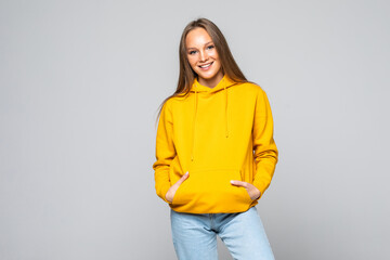 Young woman in yellow hodie isolated on white background
