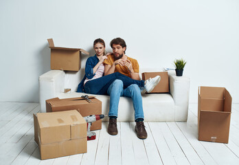 Fototapeta na wymiar married couple boxes with things moving lifestyle housewarming