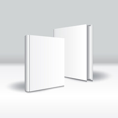 Blank white front-back standing hardcover book mockup template. Isolated on gray background with shadow.