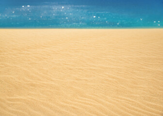 Fototapeta na wymiar Empty sand beach in front of summer sea with copy space