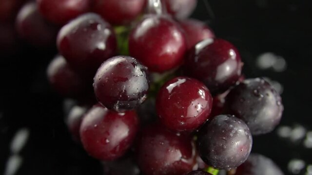 Fresh grapes in black background