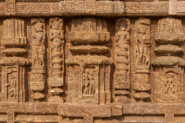 Detail of religious carvings decorating the ancient Surya Hindu Temple at Konark Orissa India. 13th Century AD