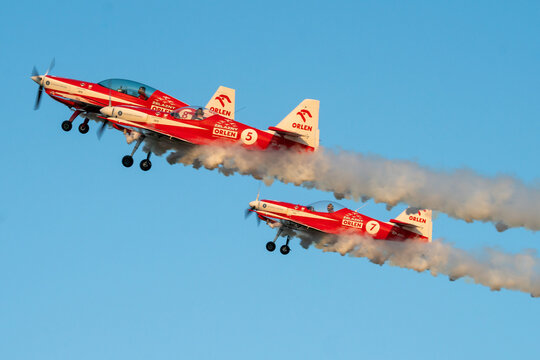 Zelazny aerobatic group representing the logo of the Orlen oil company