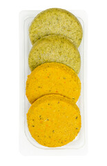 Vegetable patties in a plastic container. Ready to fry vegan patties, made of butternut pumpkin or broccoli, on a soy and wheat protein base. Convenience food. Close-up isolated over white food photo.