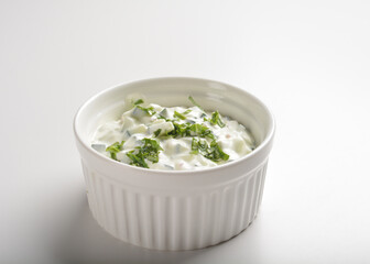 handmade fresh white sour cream dip sauce in white bowl background halal western menu
