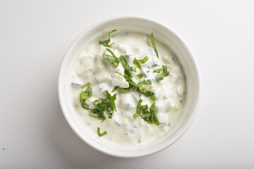 handmade fresh white sour cream dip sauce in white bowl background halal western menu